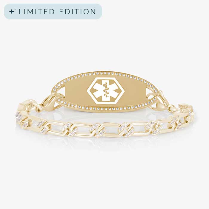 Elegant gold medical ID bracelet with CZ-accented chain and gold ID tag featuring crystal border and white medical caduceus symbol.