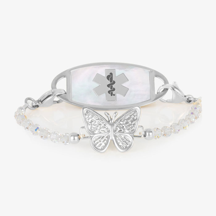 Silver medical ID bracelet with butterfly crystal strand and mother-of-pearl alert tag featuring the Star of Life symbol.