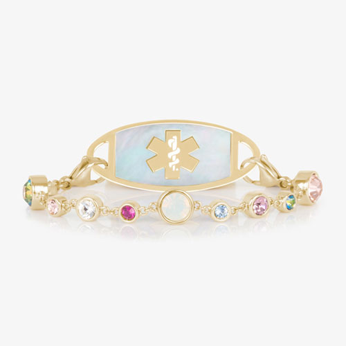 	Mia Gold bracelet paired with a medical ID tag featuring an Mother of pearl inlay and medical alert symbol with colorful crystal accents.