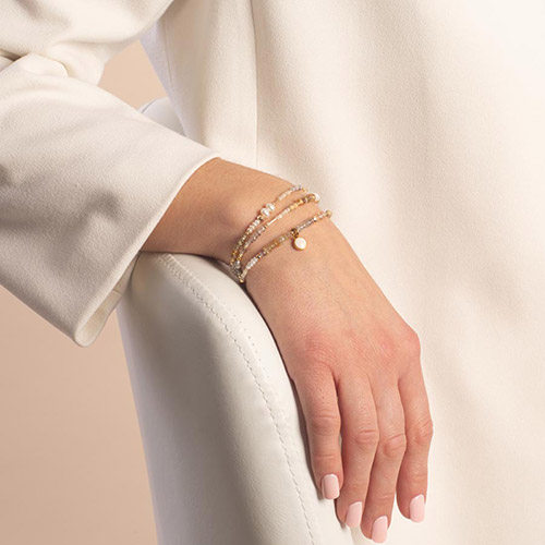 Leighton Beaded Medical ID Bracelet in Citrine and Pearl, shown on wrist, featuring freshwater pearls and citrine beads with a custom gold-tone medical ID tag