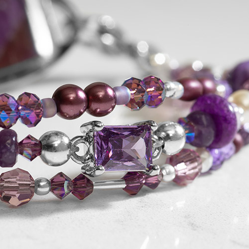 Close up of beautiful purple medical ID bracelet with silver accents