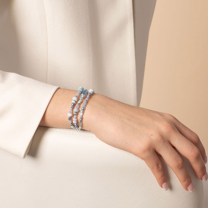 Stylish silver Dewdrop medical ID bracelet worn on wrist, showcasing its delicate chain and engraved medical alert emblem.