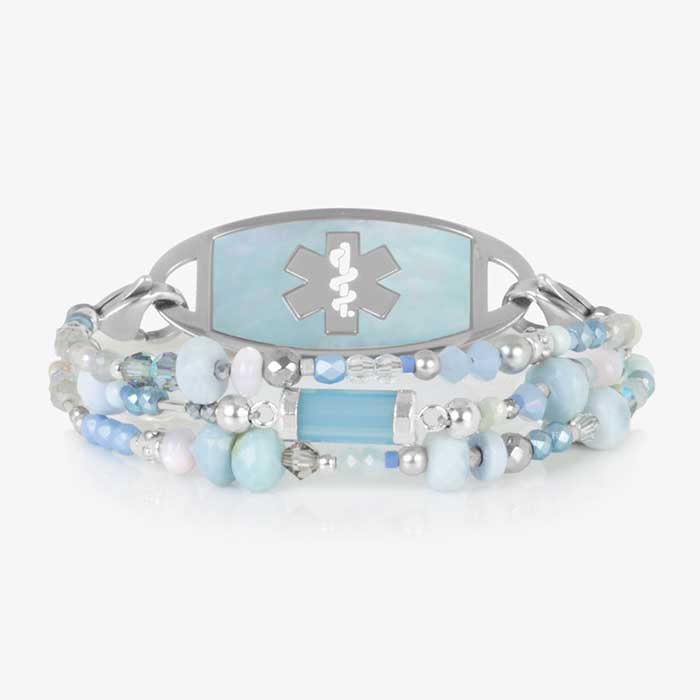 Silver Dewdrop medical ID bracelet featuring a blue mother-of-pearl inlay and an engraved medical alert symbol for safety and elegance.