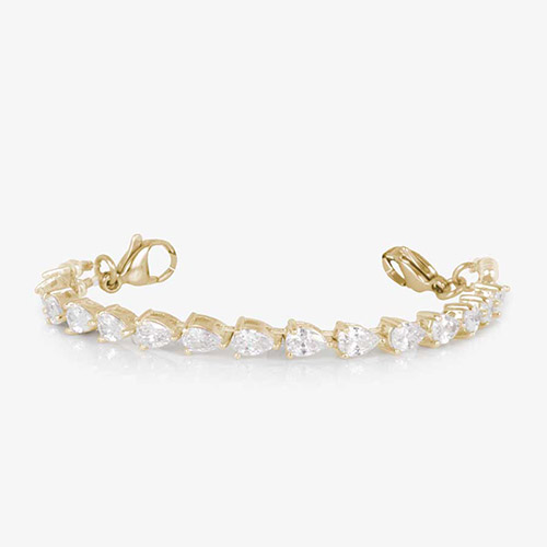 Side view of stretch medical alert bracelet for women with pear-shaped CZ links in gold-plated settings and dual lobster clasps.