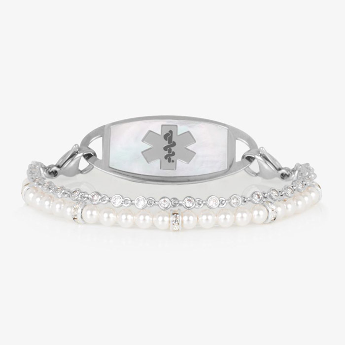 Silver medical ID bracelet with dual strands of pearls and crystals, shown with a silver mother-of-pearl ID tag featuring a medical symbol.