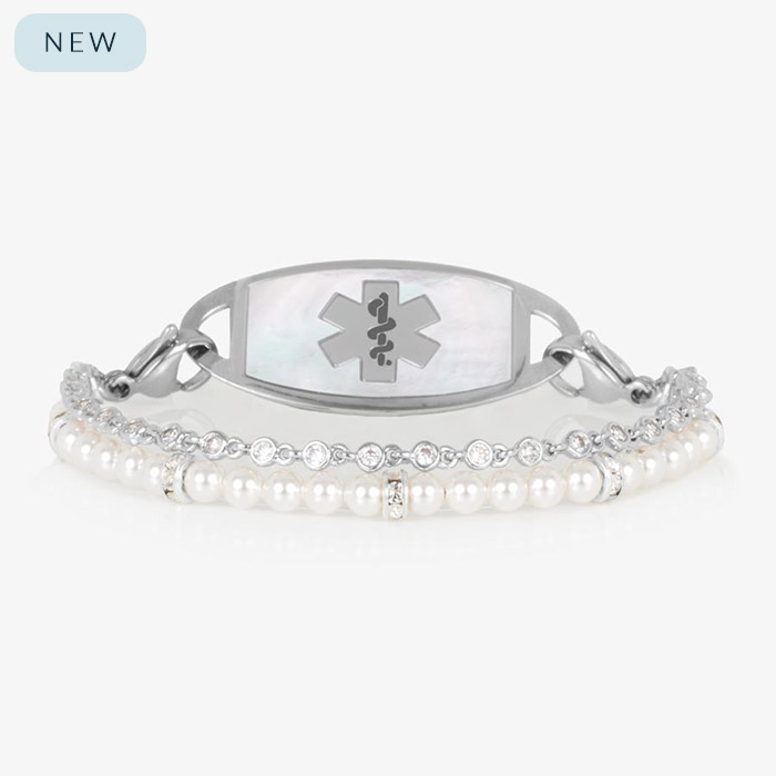 Silver medical ID bracelet with dual strands of pearls and crystals, shown with a silver mother-of-pearl ID tag featuring a medical symbol.