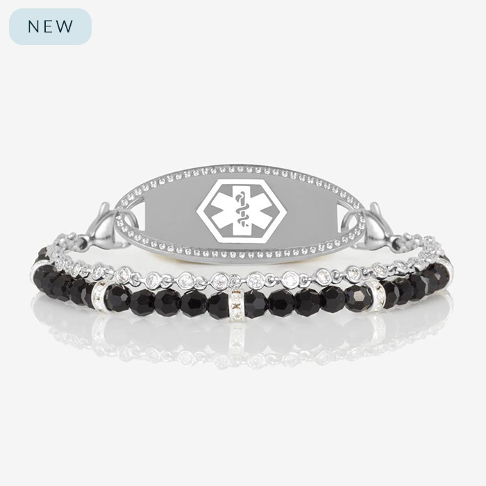Two-strand medical ID bracelet in silver featuring a sleek oval medical ID tag with a border of clear crystals.