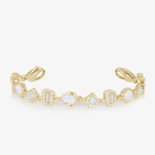 Gold-tone bracelet with alternating pear, oval, round, and rectangular opalescent and light pink stones in geometric settings.