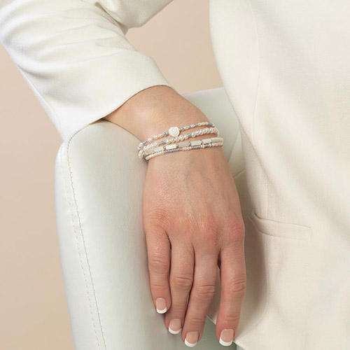 Abby Multi-Strand Beaded Medical ID Bracelet in Pearl and Silver, shown on wrist, with a standout rosette bead and custom-engraved medical ID tag