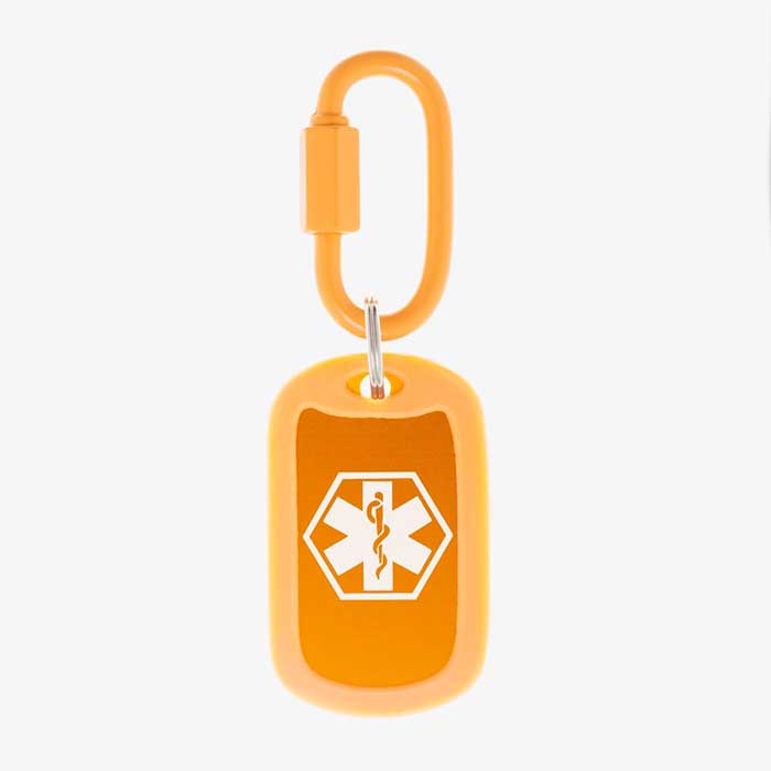 Carrot aluminum bag tag with white medical symbol and coordinating silicone silencer on matching carabiner clip.