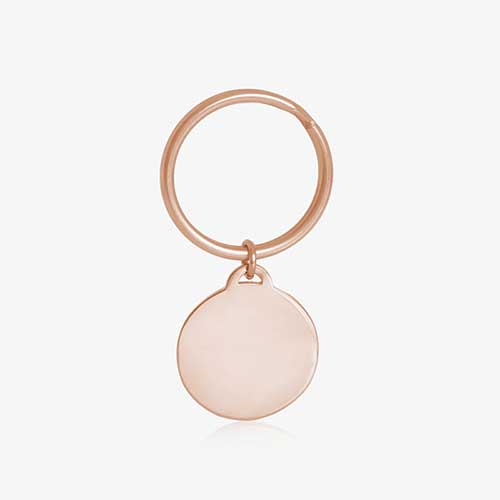 Key ID - rose gold tone circular charm blank back side