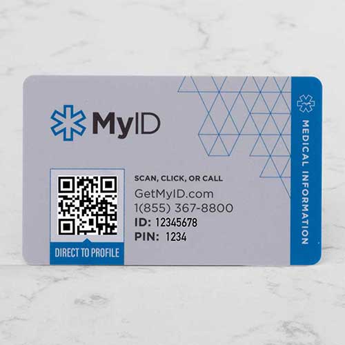 Online Health Profile Wallet Card displayed on white marble.