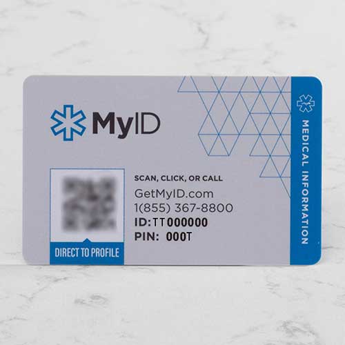 Online Health Profile Wallet Card displayed on white marble.